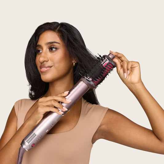 What are the benefits of combining hot air and heated ceramic to style and straighten hair?